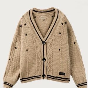 Beige Cable Knit Cardigan with Star Accents
Limited Edition Fearless
